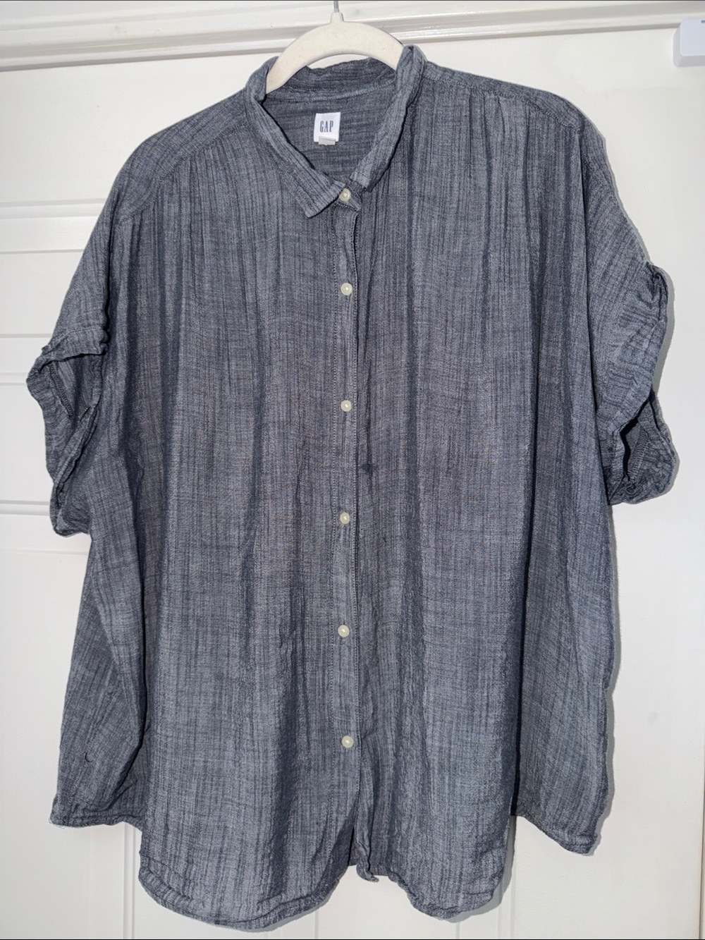 GAP Women's Short-Sleeve Button-Down Shirt in Charcoal Blue. Lightweight gauzy